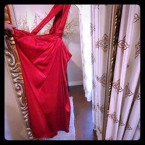 Red satin one-shoulder cocktail dress.